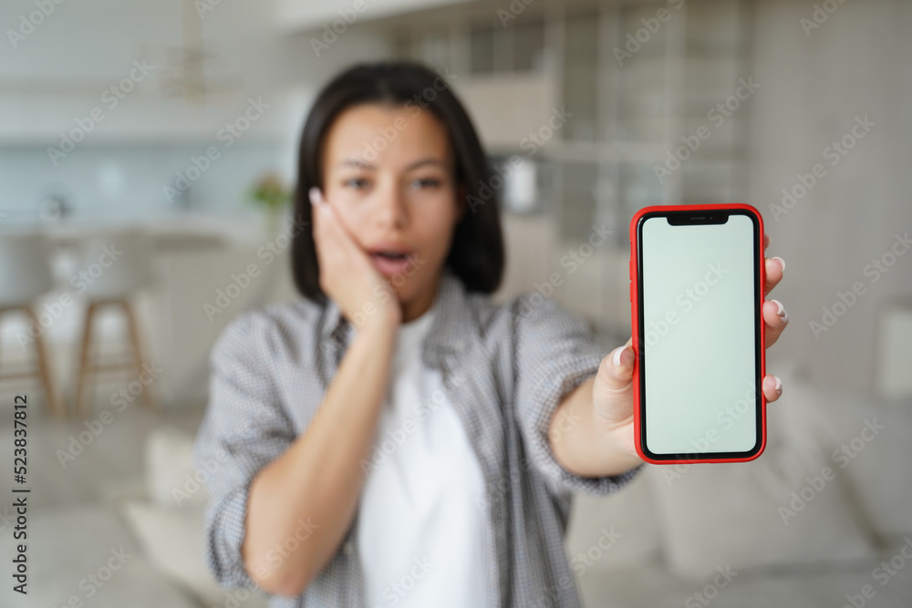 Excited girl shows phone display and touchscreen. Communication technology advertising banner.