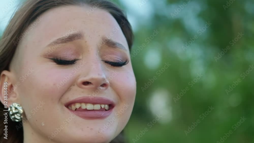 Portrait of a young woman with makeup crying Portrait of a young woman with makeup crying