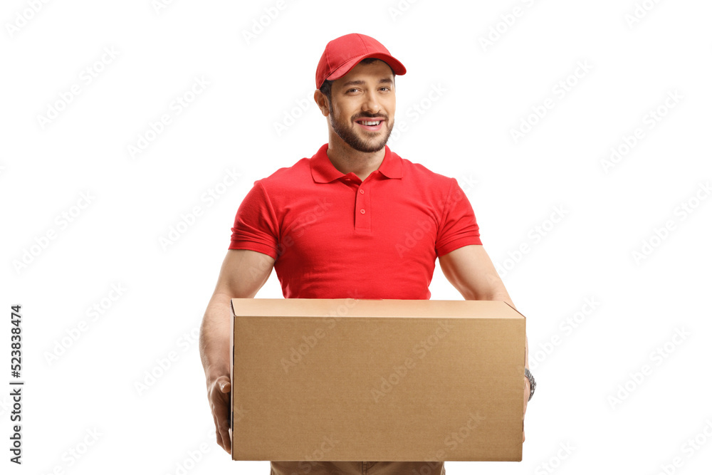 Young delivery man with a cardboard package Young delivery man with a cardboard package