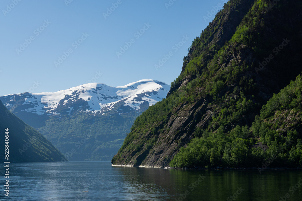 Spectacular views of the great Geiranger fjord surrounded by high mountains in Norway.