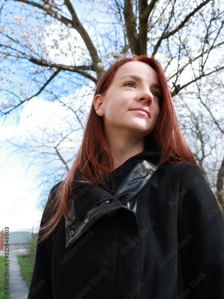 the girl with red hair in the park the girl with red hair in the park