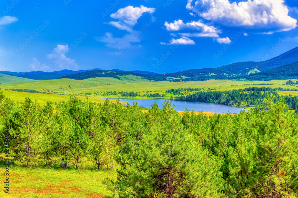 Fototapeta premium Aerial view over mountain lake at Zlatibor, Serbia.