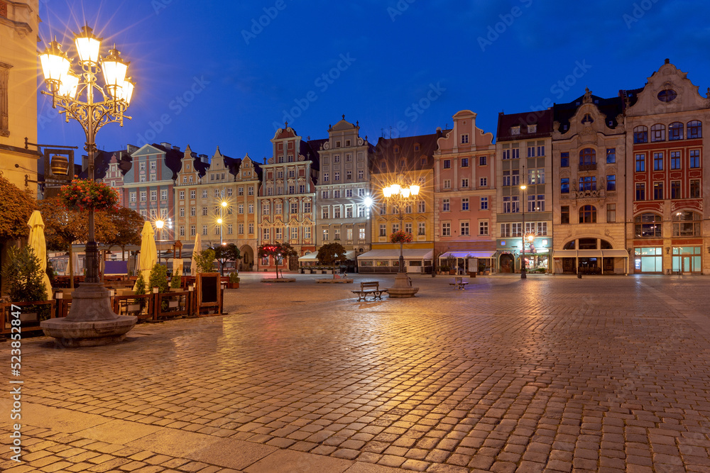 Wroclaw. Old medieval buildings in the market square at dawn.