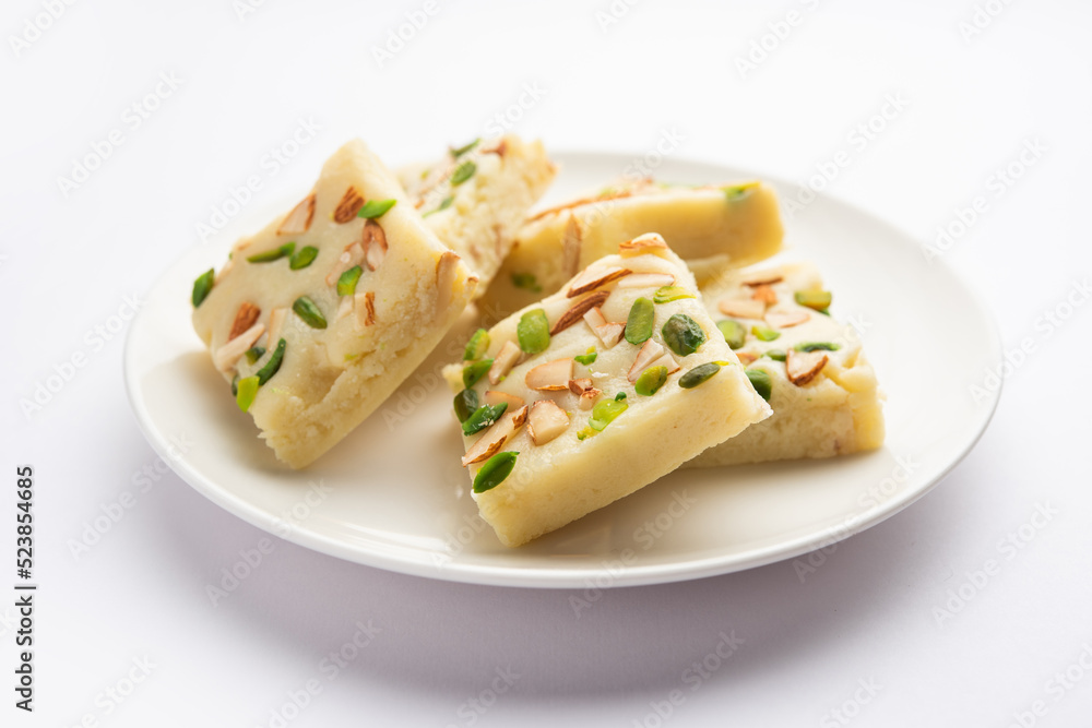 Milk powder barfi also known as Mava burfi, white Khoya burfi or Barfee, Indian Sweet food Milk powder barfi also known as Mava burfi, white Khoya burfi or Barfee, Indian Sweet food