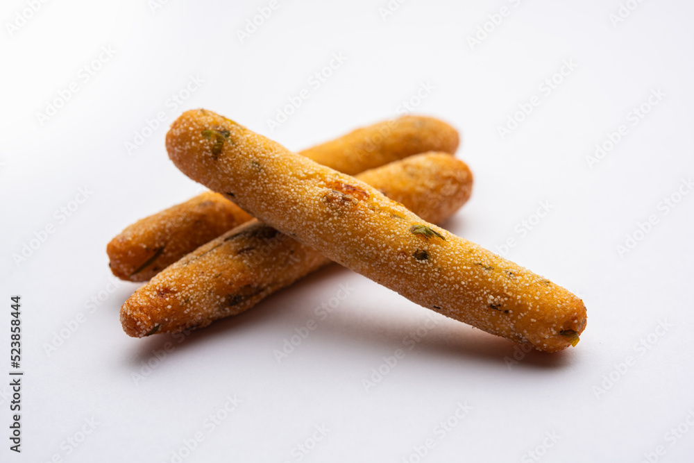 crispy Rava Aloo fingers or Potato semolina fried finger sticks served with ketchup crispy Rava Aloo fingers or Potato semolina fried finger sticks served with ketchup