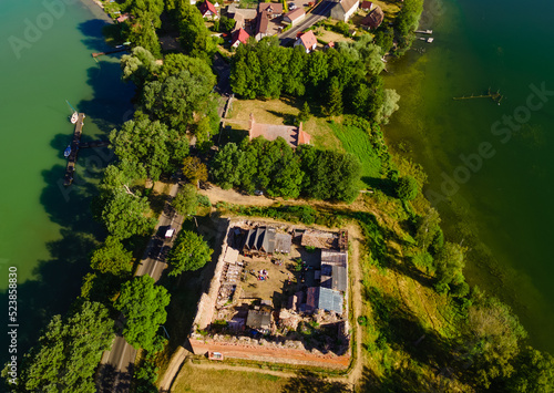 Stare Drawsko, Poland August 16 2022: Ruins of the Castle of the Templati Drahim on Lake Drawsko