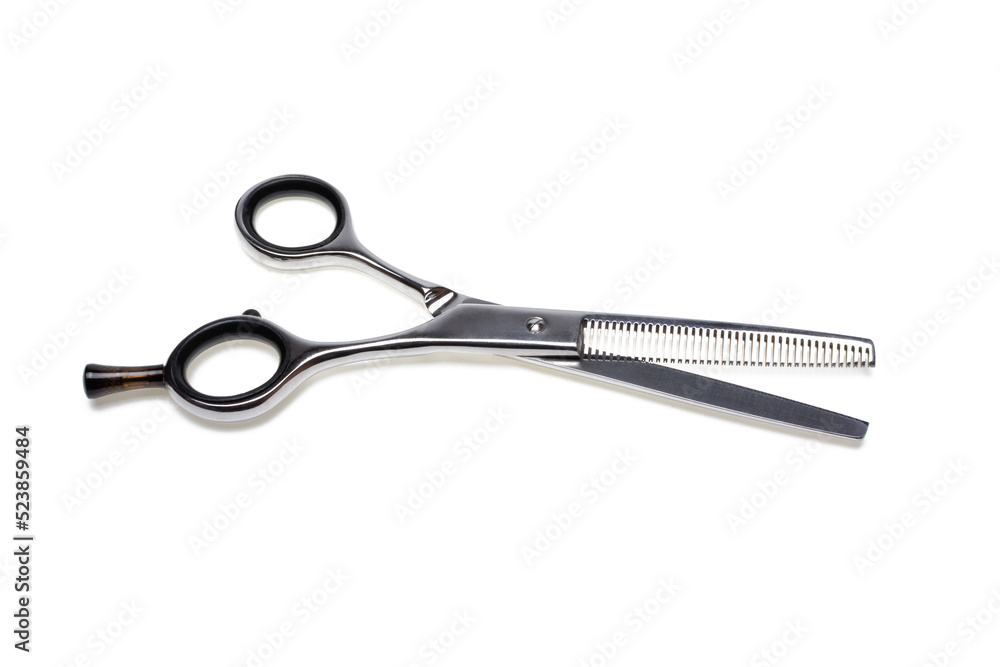 Professional Barbers thinning scissors, isolated on white background. Closeup. Hairdresser service, salon concept. Haircut accessories Professional Barbers thinning scissors, isolated on white background. Closeup. Hairdresser service, salon concept. Haircut accessories