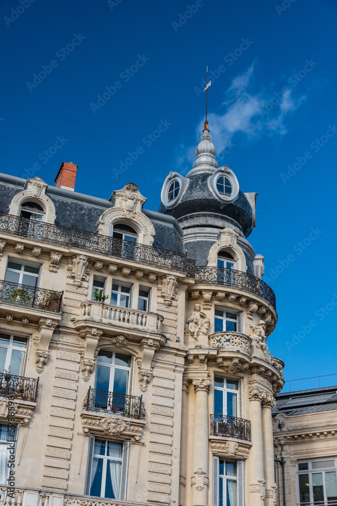 building in the center of the city in Montpellier france park in autum with clear sky royal monarch