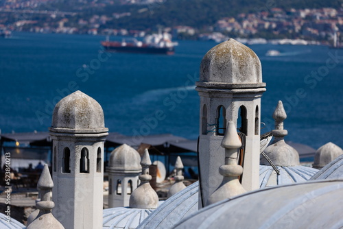 Facades of ancient buildings in Istanbul. Public places on the streets of the city. photo