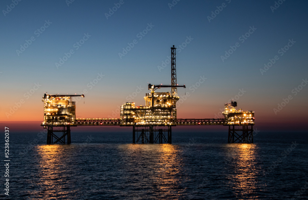 Oil plattform instalation in sunset