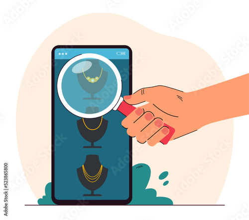 Person buying jewelry online flat vector illustration. Huge hand looking at gold necklace through magnifier. Shopping, e-commerce concept for banner, website design or landing web page