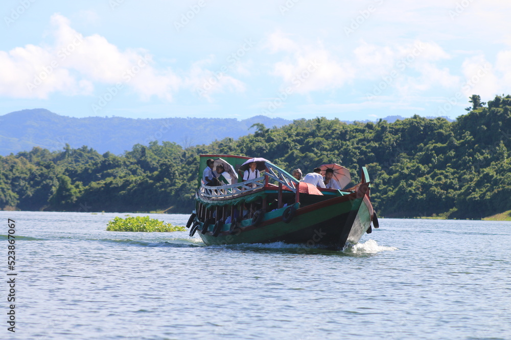 Engine boat is the main transportation of Kaptai lake Local people and school student for their education.