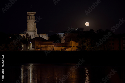 Full moon above the Valence city cathedrale. France 2022