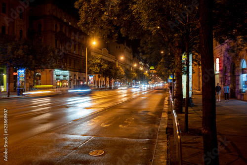 Cars speed through main road through Budapest at night