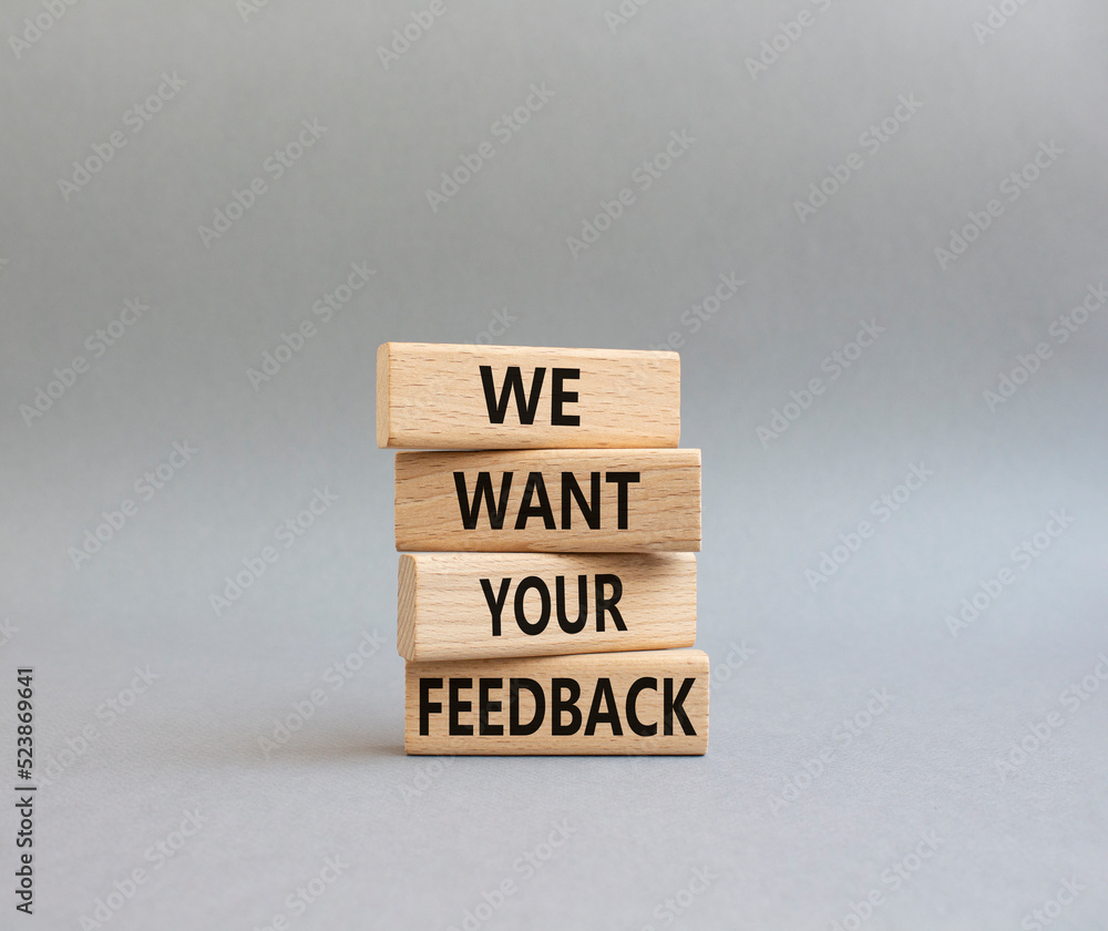 We want your feedback symbol. Wooden blocks with words We want your ...