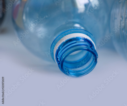 Used plastic bottle on a light background