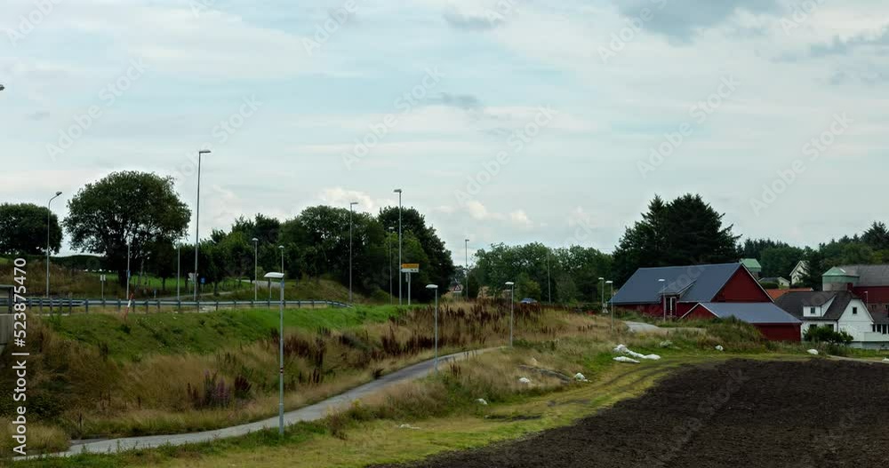 Norwegian farm located along the main road and cycle path Norwegian farm located along the main road and cycle path