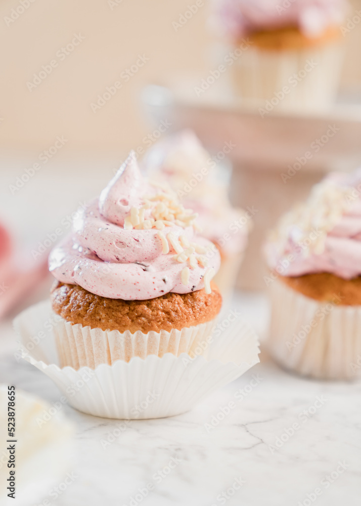cupcakes with whipped butter cream blackberry strawberry lemon cake