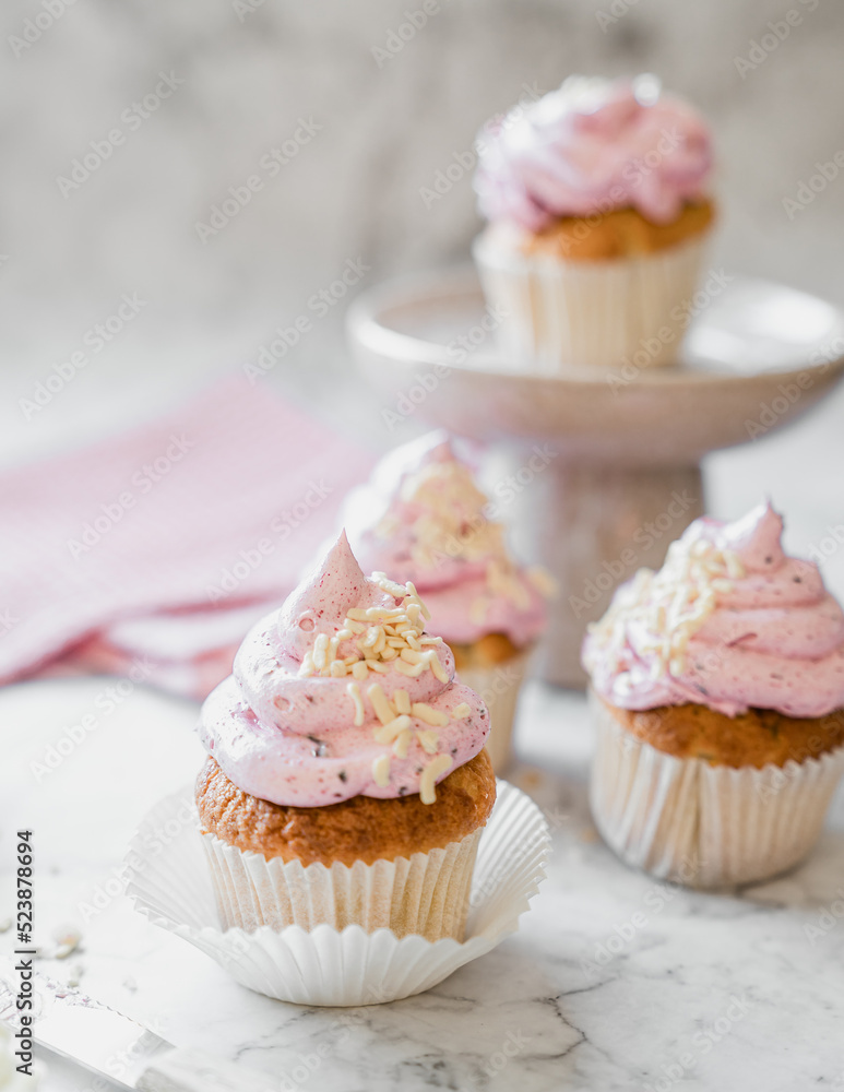 cupcakes with whipped butter cream blackberry strawberry lemon cake