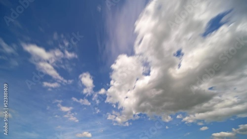  time lapse of clouds on blue sky photo