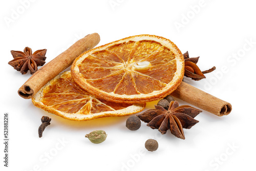 Fototapeta Naklejka Na Ścianę i Meble -  Spices for winter dishes, isolated on white background. Mulled wine or ingredients for seasonal Christmas baking are aromatic spices. Close-up