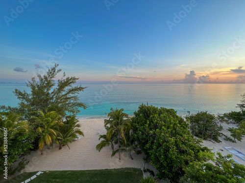 Obraz na plátně An aerial view of Cemetery Beach on Seven Mile Beach in Grand Cayman Island with a beautiful sunset