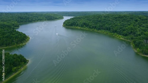 Recreational boats traffic on the curves of Taylorsville lake in Central Kentucky photo