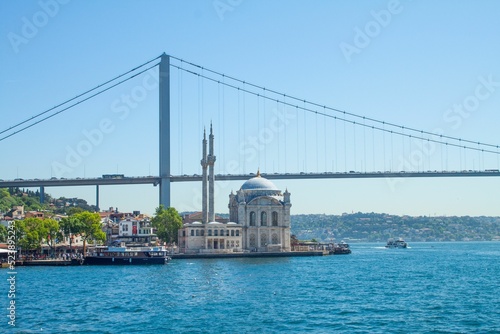 Beautiful view of the Grand Mecidiye Mosque (Ortakoy Mosque) in Istanbul under the clear sky photo