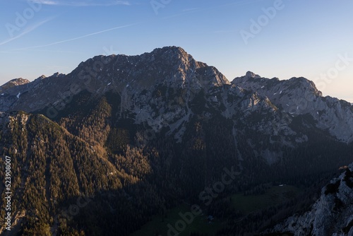 Picturesque sunrise of an alpine valley ,on Karavanke mountain range,  Begunjscica 2060m ,Slovenia photo