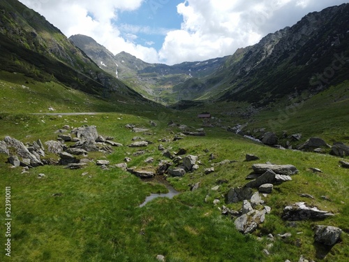 Scenic view of a mountain valley with luxuriant green vegetation