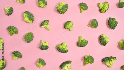 Broccoli creative pattern on pastel pink background. Healthy food vegetables concept. Flat lay