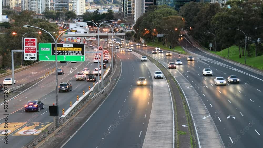 Warringah freeway in Sydney city – multi lane motorway at sunset as 4k.
Warringah freeway in Sydney city – multi lane motorway at sunset as 4k.