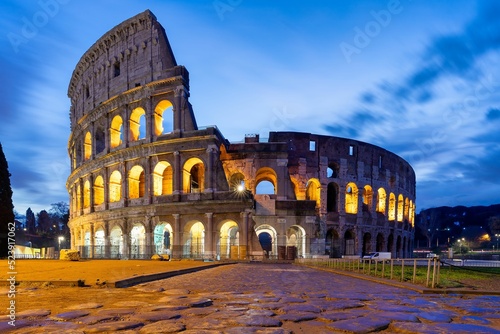 Fototapeta Mesmerizing view of the Colosseum in Rome at dawn