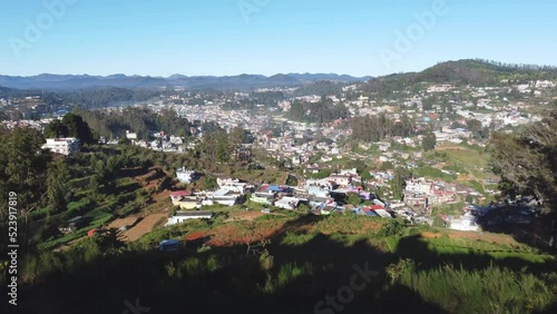 Aerial view of modern buildings in the forest in Ooty, India photo