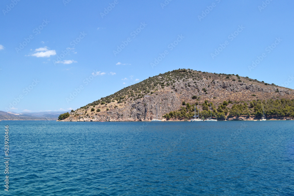 View of Romvi island from Tolo, a small seaside village on the Peloponnese peninsula.