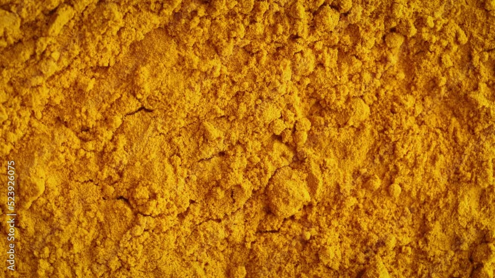 turmeric Curcuma yellow dried roots powder background turmeric Curcuma yellow dried roots powder background