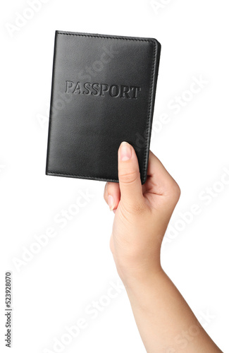 Woman holding passport in black leather case on white background, closeup