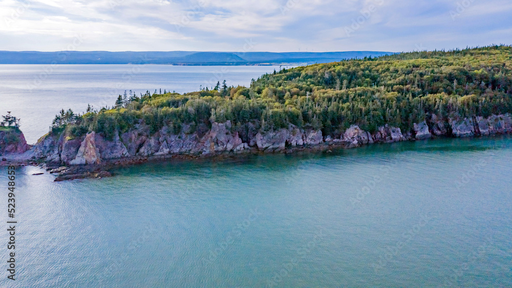 Drone view of Green Island in Canada. Island Aerial View. Beach Island. Blue Water Island.