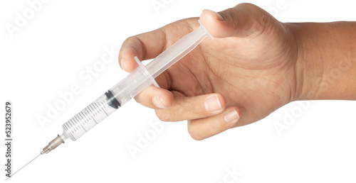 Syringe medical injection in hand. photo