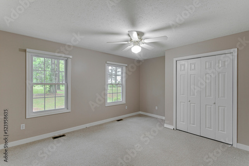 Canvas-taulu empty room with window traditional interior design with grey beige neutral walls