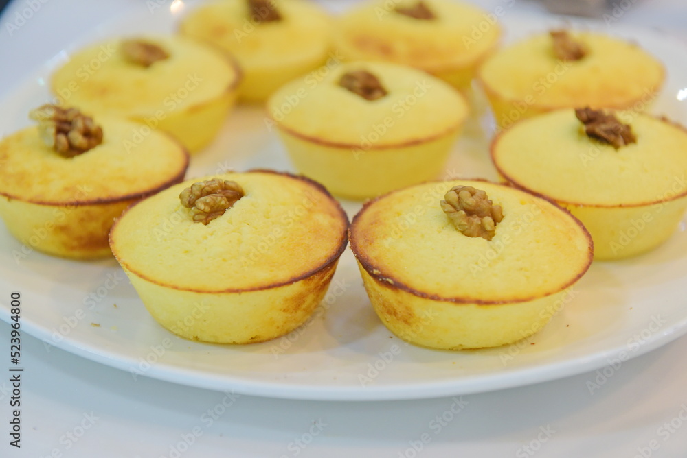 Almaty, Kazakhstan - 08.28.2015 : Cupcakes with nuts. Cooking breakfast.