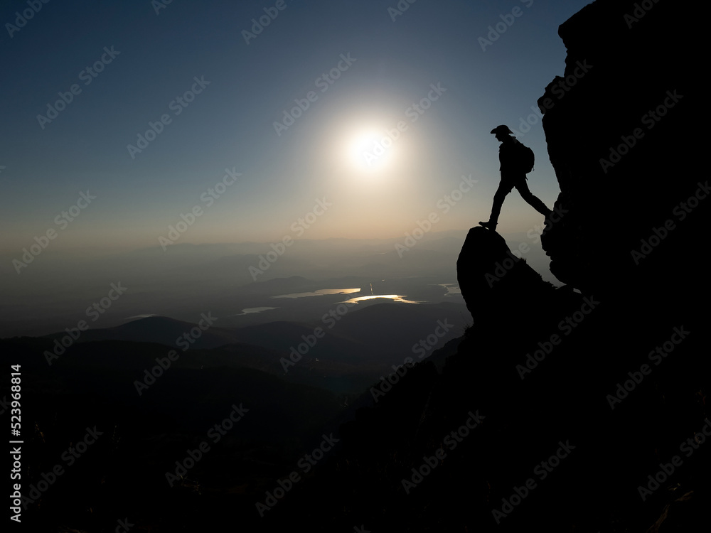 summit success of adventurous mountaineer in risky places summit success of adventurous mountaineer in risky places