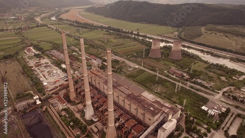 Aerial view of disaffected coal power plant, at sunset
