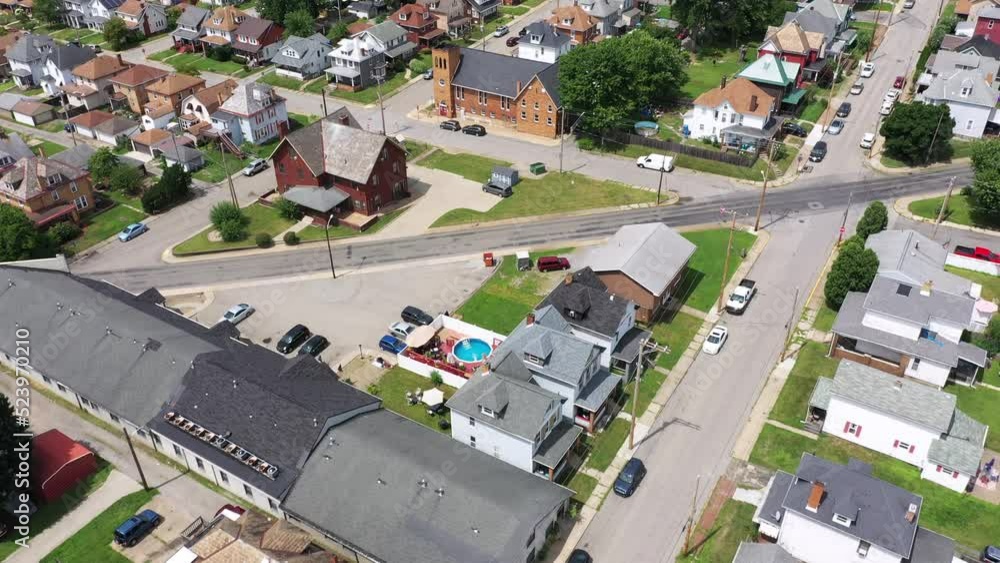 A slow forward aerial tilt up shot of western Pennsylvania homes in the summertime. Pittsburgh suburbs. A slow forward aerial tilt up shot of western Pennsylvania homes in the summertime. Pittsburgh suburbs.
