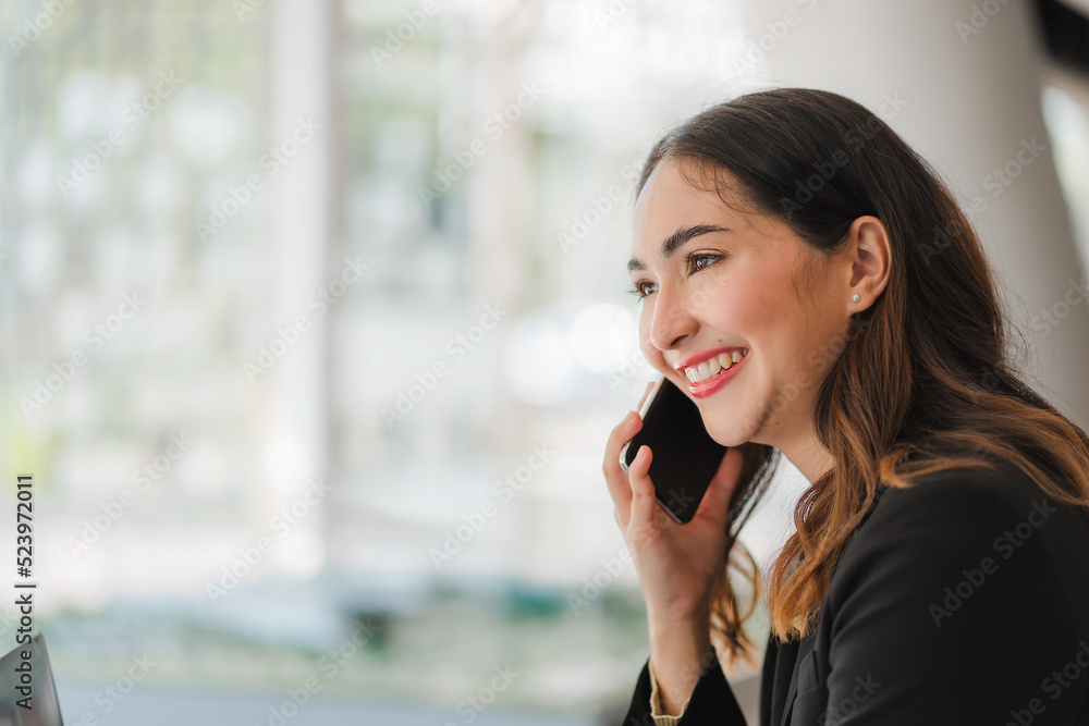 Asian business woman working in finance with laptop and smartphone, accounting concept. Asian business woman working in finance with laptop and smartphone, accounting concept.