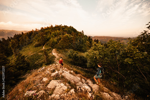 Slovakia mountains nature. Traveler hiking with backpacks on Zvolen paek  from donovaly saddle, Big Fatra. Slovakia mountains landscape photo