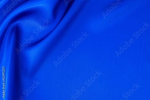 Close up of dark blue silk background
