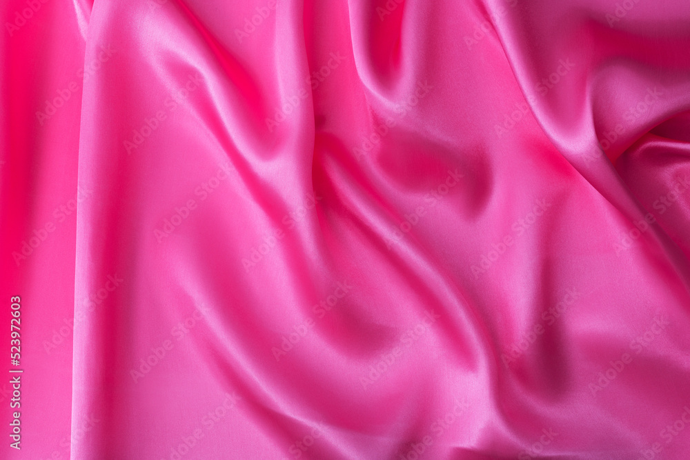 Fototapeta premium Close up of pink silk background