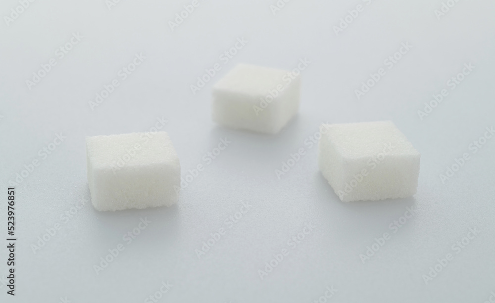 Three sugar cubes on white background Three sugar cubes on white background