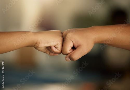 Power, teamwork and solidarity fist bump gesture of people showing support, success or achieving goal. Celebrating, winning hands doing greeting as motivation, unity or team effort emoji